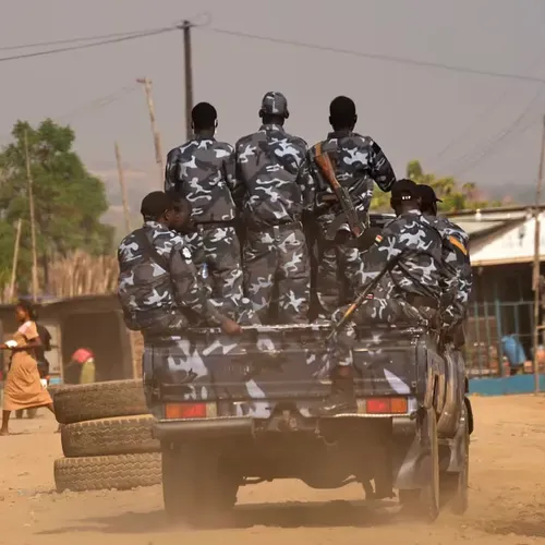 South Sudan soldiers patrol the street in Juba in pickup with AK-47s